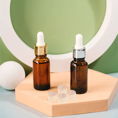 Tapered Wood Plugs For Screw Holes With Button Plug Head, displayed beside brown glass dropper bottles on a wooden hexagonal base.