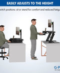 Man using 36 Inch Wide Standing Desk Converter For Dual Monitors Sit To Stand Workstation Height Adjustable Up To 17.3 Inches With Large Keyboard Tray Black Easy Install Ergonomic Durable Pro Grade, demonstrating height adjustment.