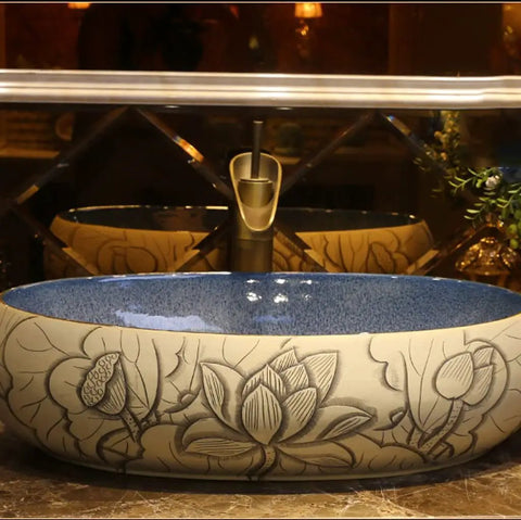 Bathroom Sinks Bathroom Vessel Sink Carved Lotus Art Countertop Basin oval ceramic washbasin with intricate lotus design.