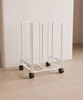 Game Changer Mobile Storage Cart And Roll Right Through Box Holder Rack Built With Slick Gliding Casters in white steel on casters.