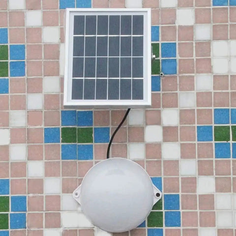 JUDYSSY Led Solar Flood Light,Two-Color Remote Ligent timing solar panel and round lamp mounted on tiled wall.