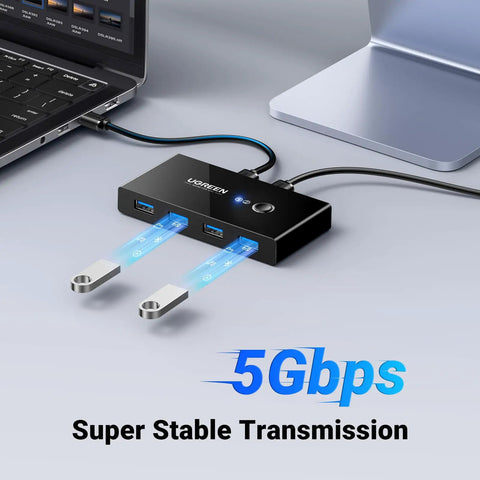 Two In Four Out USB 3.0 Switcher For Two Computers With Four Shared USB Ports, high-speed data transfer shown with USB drives