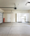 Spacious garage with Pro Grade Ultra Bright LED Garage Light With Motion Sensor 5000 Lumens 4000K Cool White.