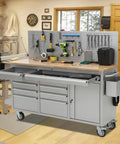61 Inch Rolling Tool Chest With 10 Drawers And Solid Rubber Wood Top Mobile Workshop Station 1675 Lb Capacity Includes Power Strip Locking System Drawer Liners Built To Take A Beating For Garage Shop And Warehouse Repairs. front view in garage