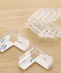 Safe Corner Protectors For Furniture With Double Sided Adhesive Tape 30 Pack PVC Corner Bumpers on wooden surface
