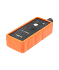 Heavy Duty Tpms Relearn Tool Oec-T5 For No Mess Automotive Tire Pressure Sensor Activation Reset And Dead Easy Programming Setup Fits Virtually Any Ride Orange shown from the side with buttons.