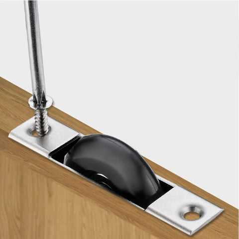 Heavy Duty Sliding Door Roller Replacement Kit Featuring 29mm Black Nylon Wheel And Electroplated Steel Housing For Super Slick Glide Motion On Garden Patio Doors And Window Rollers Pack Of Two installed in door.