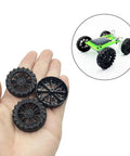 30Pcs Plastic Toy Car Wheels With 2mm Shafts And 15Pcs Round Rod Axles For RC Cars Trucks Robots DIY Model Parts Black, shown in hand