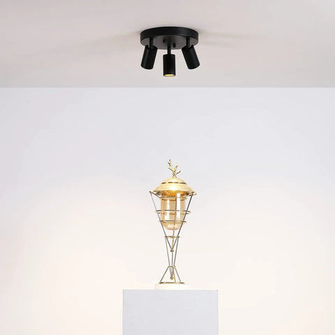 Shura Round 3-Light Black LED Ceiling Light With Rotatable Heads, Adjustable Flush Mount, 3000K Warm White, 1365 Lumens in modern room