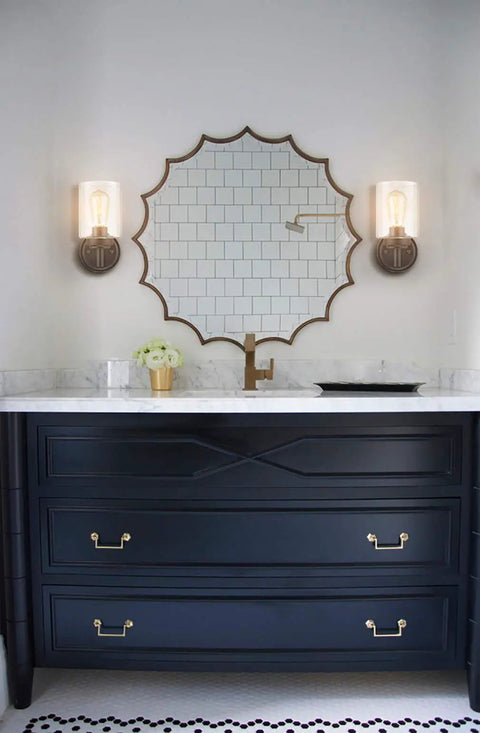 Cool Industrial Black Wall Sconces Two Pack With Cylindrical Clear Glass Shades in modern bathroom setting