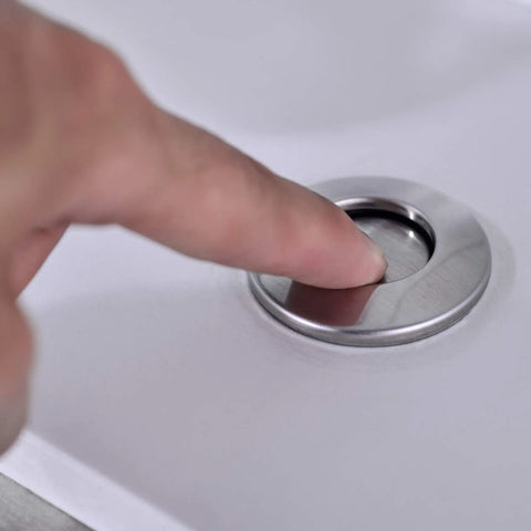 Sink Top Air Switch Kit For Garbage Disposal With Long Button Brushed Nickel Finish Stainless Steel Button Cover Fits Any Food Waste Disposer And Dishwasher Easy Install And Durable in use, finger pressing brushed nickel button on sink.