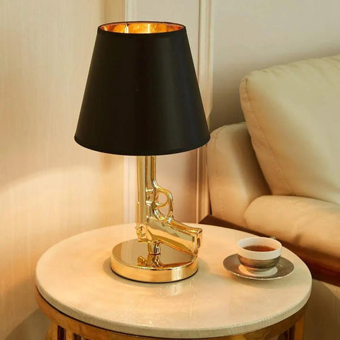 Gold Gun Desk Light With Linen Shade, Modern Pistol Style Desk Lamp on round table beside sofa, Nordic Metal Craft
