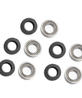 Close-up of Five Piece 1/4 Inch Router Bit Bearing Kit With Ball Bearings For Shank Bottom Mounted Inner 1/4 Inch Outer 1/2 Inch Alloy Steel