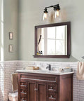 Retro Industrial 2-Light Wall Sconce Set With Dual 5.6 Inch Bell Shaped Clear Glass Lampshades, Black Finish for Bathroom Vanity