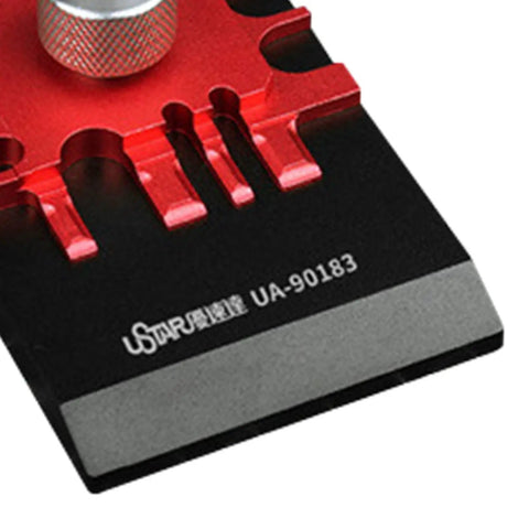 Close-up of Metal Small Etched Parts Bender Model UA90183, showing red metallic details on black base, precision tool for hobbyists.