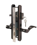 Top Tier Hinged Patio Door System With Slick Lever Handle Mortise Lock For Screen Storm Door Quick Fix Oil Rubbed Bronze Two Way Handle Straight Setup Heavy Duty Entry Security Hardware close-up of lock with key in oil rubbed bronze finish