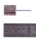 Close-up of a 20 Pack 80 Grit Flap Wheel Sander Set With Pro Grade One Eighth Inch Shank, next to a ruler showing 32mm diameter.