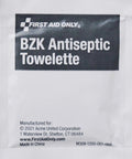 Front view of a white First Aid Only BZK antiseptic towelette packet with a black label.