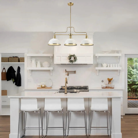Three Light Linear Chandelier In Matte White With Brass Accents above kitchen island, adjustable hanging, glam luxe vibe.