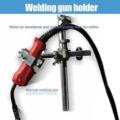 Welding gun holder with manual adjustment bracket and rubberized grip for secure operation on metal work surfaces.