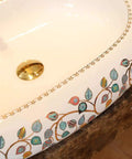 Damn Fine Hand Painted Oval Countertop Washbasin With A Truly Knockout Leaf Pattern Heavy Duty Ceramic Bathroom Sink close-up view.