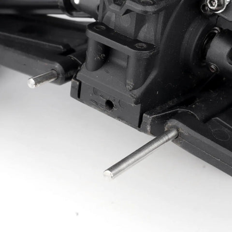 Close-up of RC truck with Must Have Complete Suspension Pin Set For 1/10 Traxxas Slash 4x4 RC Truck 12 Pack Replacement Pins visible