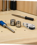 Beefy Stainless Steel Sailing Pulley Block Set 4 Pack For Marine Rigging And Kayak Gear Rugged Pulleys with tools on a table