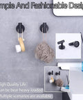 Black wall mounted hooks holding bath accessories, Brushed Gold Coat Hook Set 2 Pack Stainless Steel 304 Wall Mounted Towel And Robe Hangers.