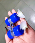 Hand holding blue Beefy 7.4V RC Jet Boat Underwater Thruster 16800 RPM CW CCW 3 blade propeller for DIY micro ROV submarine.