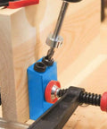 Hardcore 15 Piece Pocket Hole Jig Kit Built Like A Rock With Tough Aluminum Alloy drill bit in use on wood.