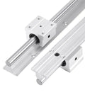 Real Deal SBR12 Linear Rail Shaft Set Built Tough With Four Matching Bushings Featuring Pre Drilled Mounting Holes For CNC Routers 3D Printers And Robotics Projects close-up of shafts and bearing blocks.