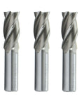 Three silver 7/8 in HSS end mills with 4 flutes, center-cut, standing upright.