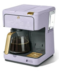 Total Game Changer Multi Brew Coffee Maker 12 Cup Glass Carafe Plus Single Serve Brewer For Pods Or Grounds Brews Over Ice No Fuss Touchscreen Dope Lavender Finish with glass carafe and touchscreen.