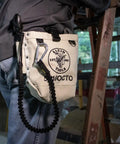 Bull-Pin And Bolt Bag Tool Pouch No 4 Canvas with Tunnel Connection in use, tethered to worker on ladder, Klein Tools 5416OCTO