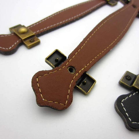Close-up of two pack vintage style PU leather cabinet handles zinc alloy drawer pulls for furniture hardware chest trunk pulls.