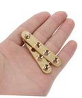 Copper Pivot Hidden Door Hinges 4 Piece Set For Cabinets And Bookcases Built To Last Heavy Duty Invisible Door Hardware shown in hand