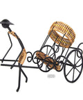 Handmade Asian Style Rickshaw Puller Wine Bottle Holder With Natural Rattan Accents, vintage black metal and rattan decor.