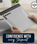 Person holding 10x13 Inch Poly Mailers 500 Pack Weatherproof Self Seal Shipping Bags for Clothes Books and Accessories