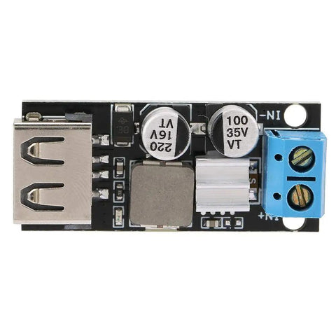 Slick And Solid Dc Dc Buck Converter Step Down Voltage Regulator Module 6V To 32V To 5V With Usb Quick Charge Port and screw terminals on a black PCB.