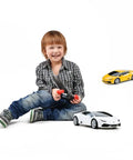 Child playing with Lamborghini Huracan LP610-4 1 24 Scale RC Car With Realistic Exterior And Interior Officially Licensed White