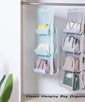 Sturdy Washable Hanging Closet Organizer With Eight Pockets Rocks for keeping handbags and accessories neat on a closet rod.