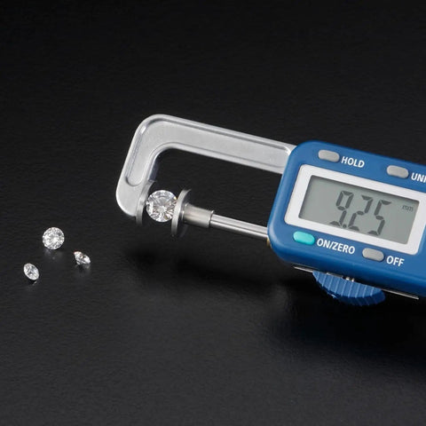 Digital Thickness Gauge 0-25mm, Electronic Vernier Caliper, 0.01mm Precision measuring a gemstone at 9.25mm.