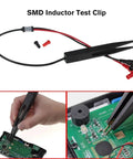 All In One SMD SMT Test Clip Leads For Digital Multimeters Probe Tweezers with gold-plated connectors testing a circuit board.