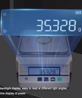 Heavy Duty Electronic Hydrostatic Balance Scale With Crisp Lcd Panel And Sturdy Metal Tray Built Legit For Dead On Precise Density And Volume Testing Up To Five KG Capacity displaying weight of 35.328 grams on easy-to-read LCD.