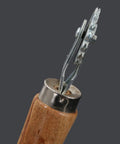 Close-up of Spur Wire Embedder Tool for Beehives with wood handle and stainless steel wire wheel for frame wiring.