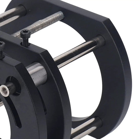 Close-up of Workhorse Four Jaw Router Lift Table's aluminum alloy milling mount with adjustable screws and robust grip.