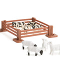 John Deere Tractor Toys Value Set with barnyard animals in fence and outdoors, part of 18 die-cast vehicles playset for kids.