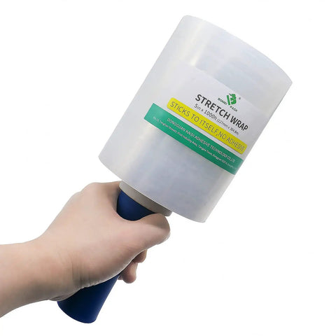 Hand holding Industrial Mini Stretch Wrap Film Replacement 5 Inch By 1000 Foot Roll 80 Gauge Heavy Duty Grip Ready Self Adhering