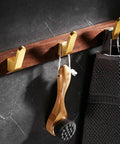 Solid Heavy Duty Wall Mounted Coat Rack Kit With Five Slick Hooks For Entryway Bathroom Organization No Sweat Storage Setup For Jackets Hats Keys Everyday Use with wood base and gold hooks.