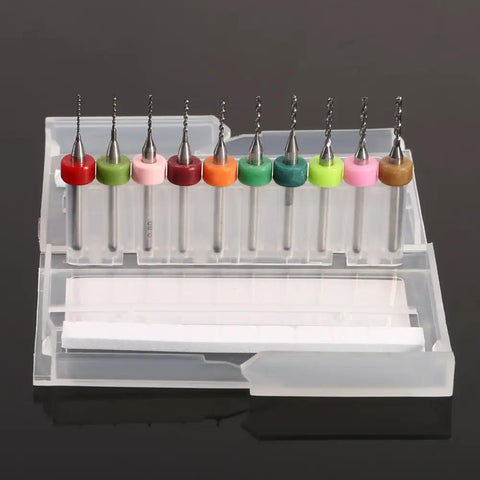 Ten Piece Set Of 0.6 To 1.5mm Pro Grade Carbide Drill Bits in a clear case, showing rainbow colored shanks.